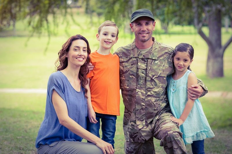 Handsome soldier reunited with family comp