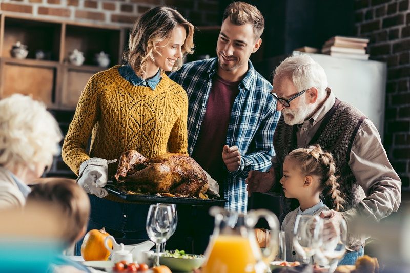 family looking at thanksgiving turkey cm