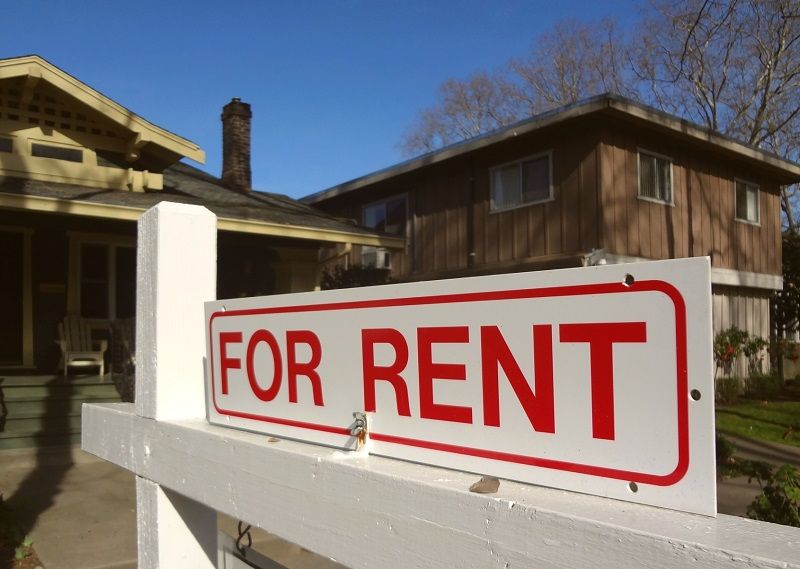 For rent real estate sign in front of a California home cm