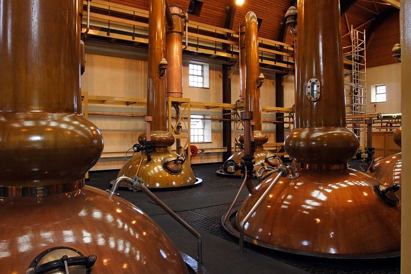 Stills in a whisky distillery cm